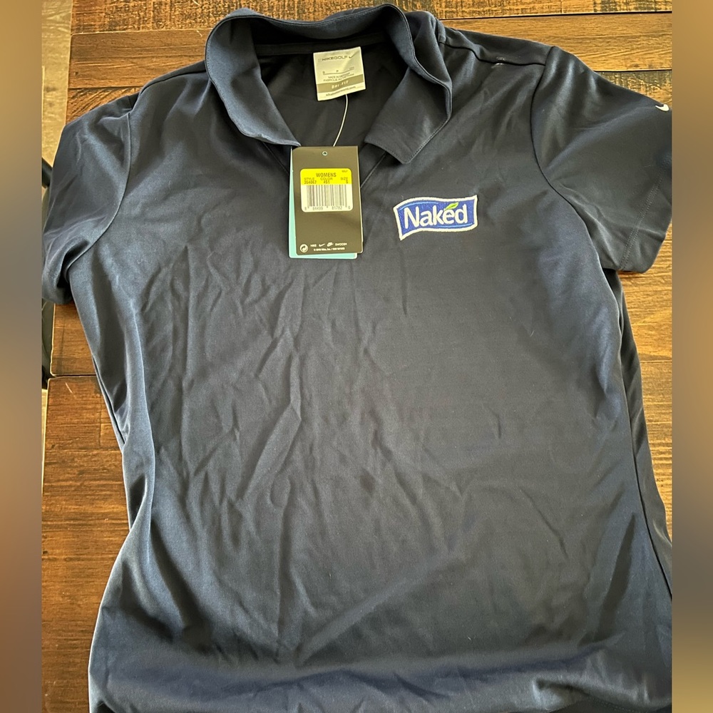 Women’s Nike golf polo, branded. New work tags never worn.